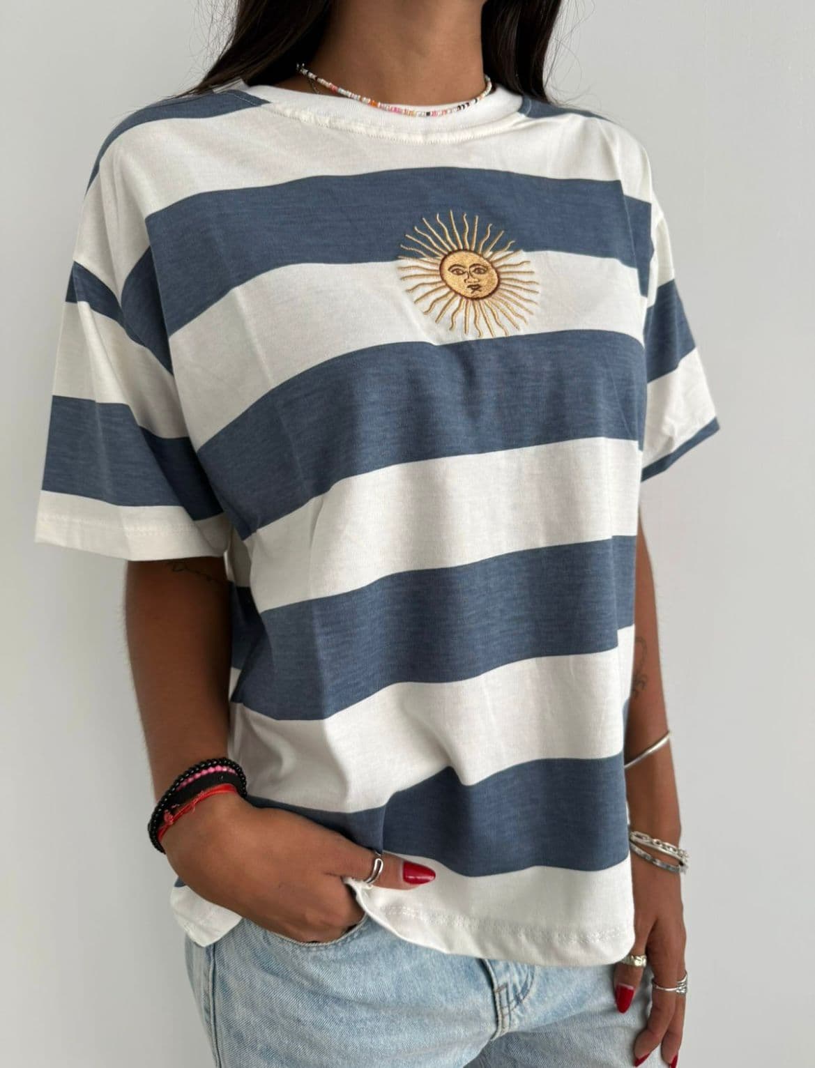 Remera rayada sol de mayo